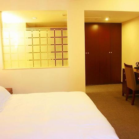Starway Porcelain Hotel Jingdezhen Kamer foto